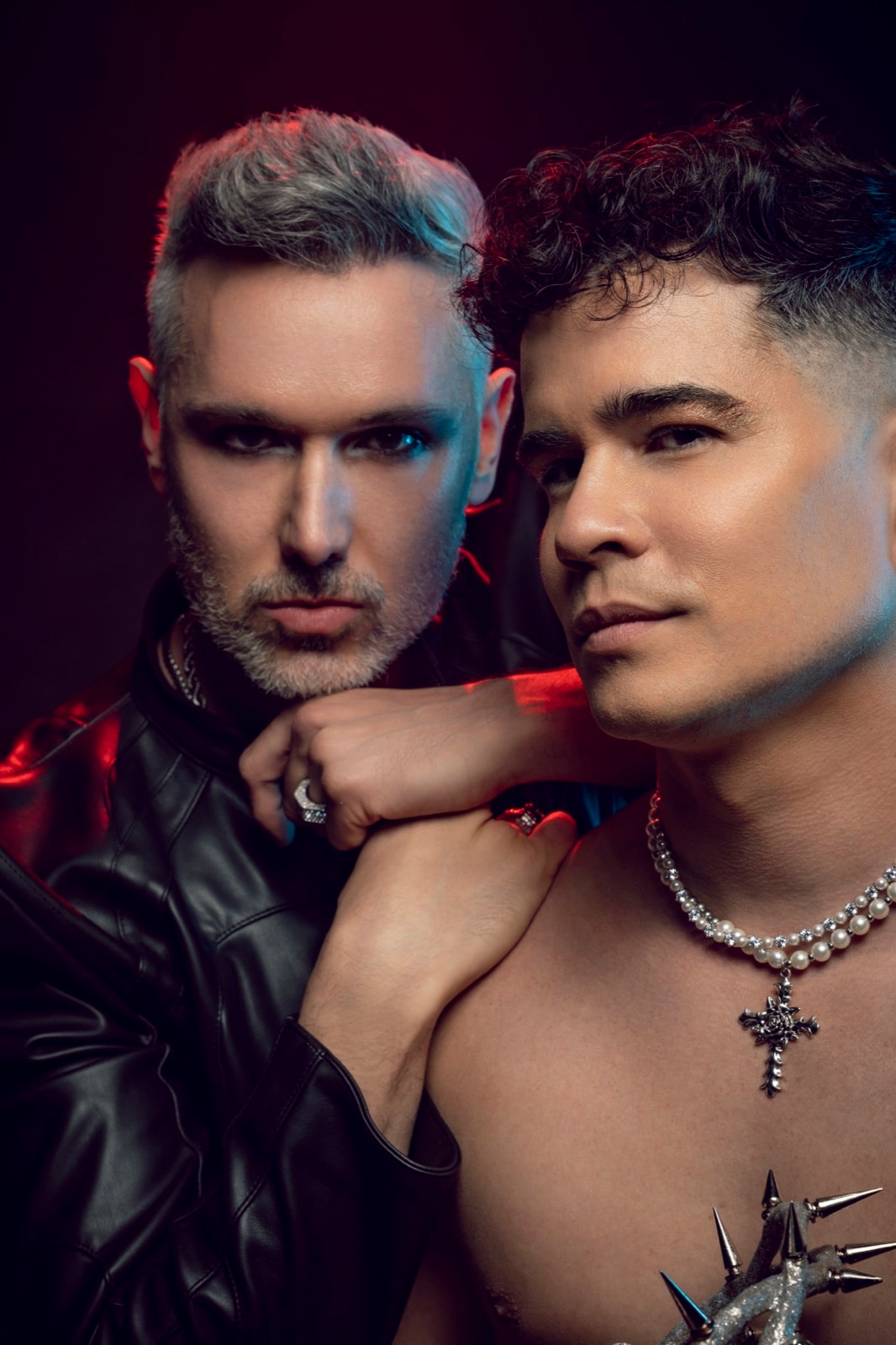 Velvet Riot — close-up portrait, black leather and pearls.